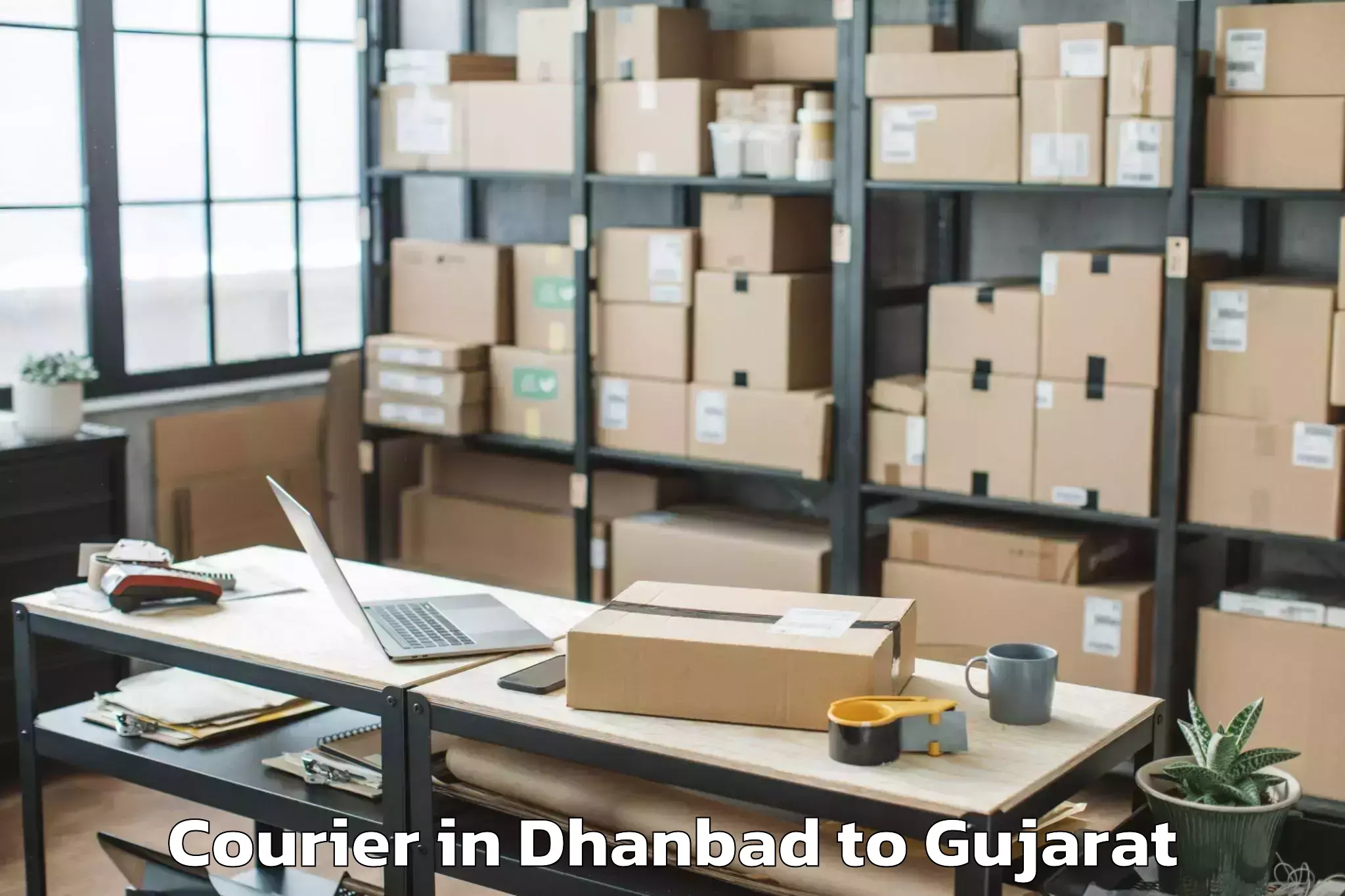 Dhanbad to Mendarda Courier Booking